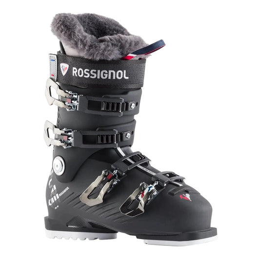 Black Rossignol Pure Pro 80 women's ski boots with grey fur lining, four buckles, and white soles in a side profile.