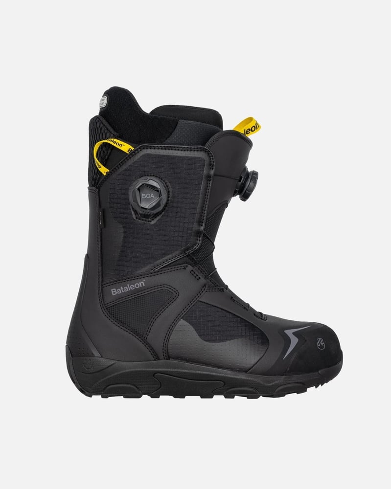 Side profile of black Bataleon Rave Double Boa men's snowboard boot with dual BOA dials and yellow pull tabs.