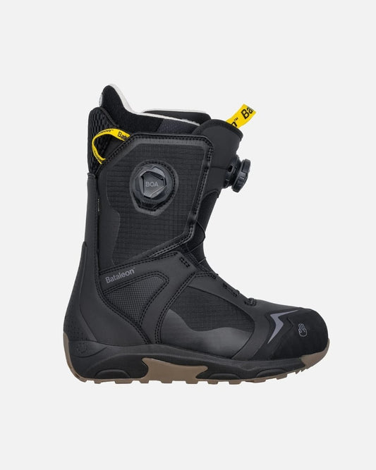 Profile of a black Bataleon Women's Rave Double Boa snowboard boot featuring dual Boa dials and yellow pull tabs.