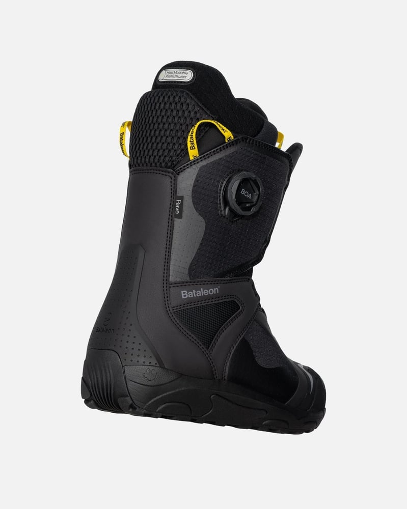 Black Bataleon Rave Double Boa snowboard boot with yellow accents and side Boa dial, shown from a rear three-quarter view.