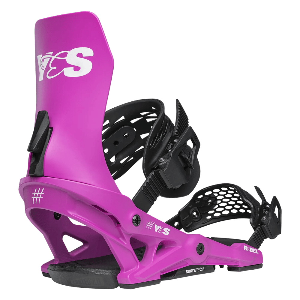 Bright pink YES Rebel women's snowboard binding with black straps and white logos, side profile view.