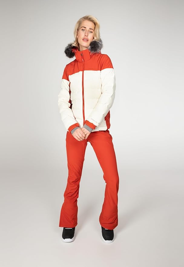 Protest Blackbird women's ski jacket in red and white with faux fur hood and matching red ski pants.