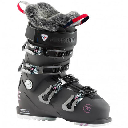 Graphite Rossignol Pure Elite 90 GW women's ski boot with four buckles and a grey faux-fur liner, angled view.
